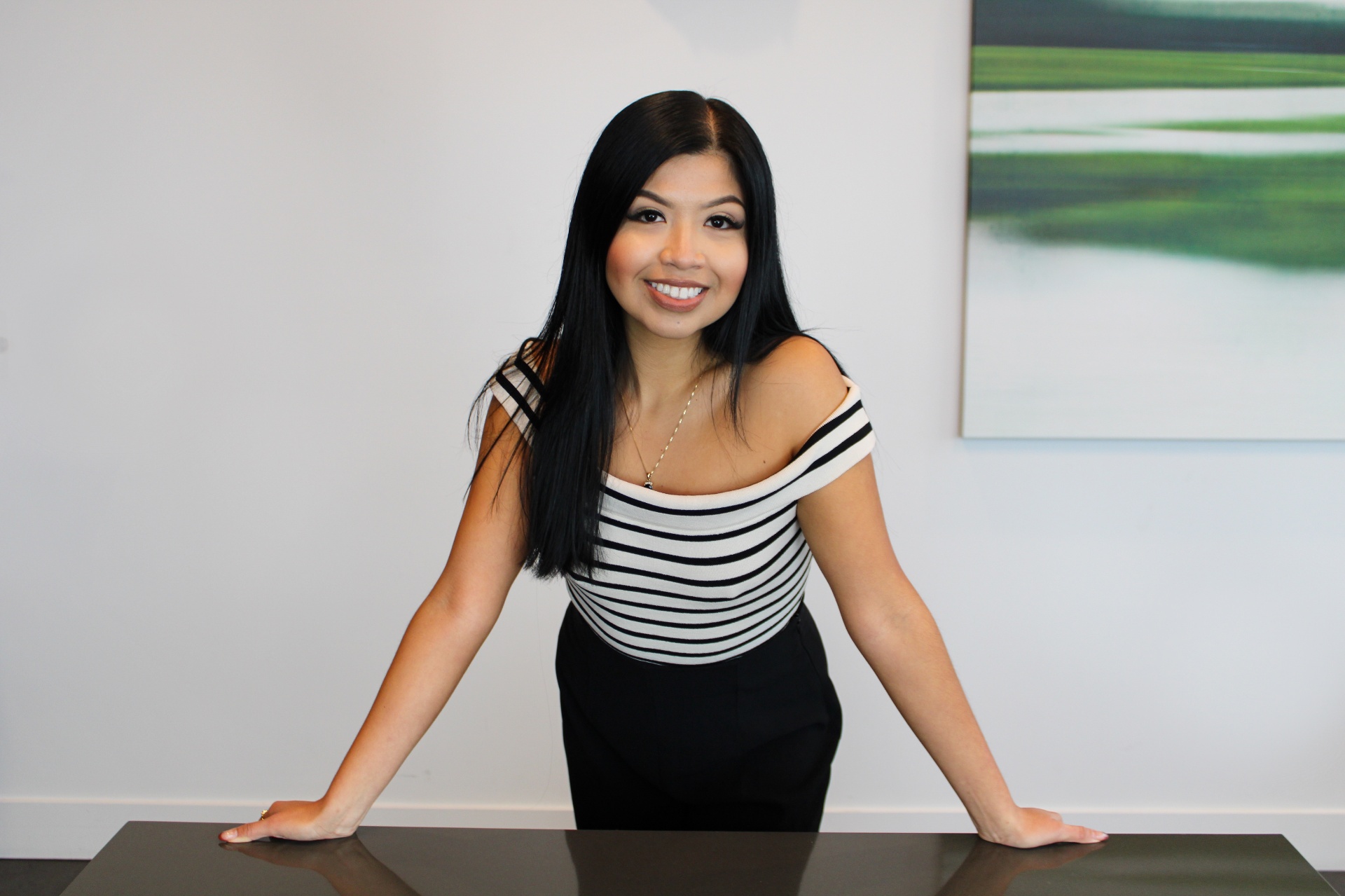 Leslee at her desk
